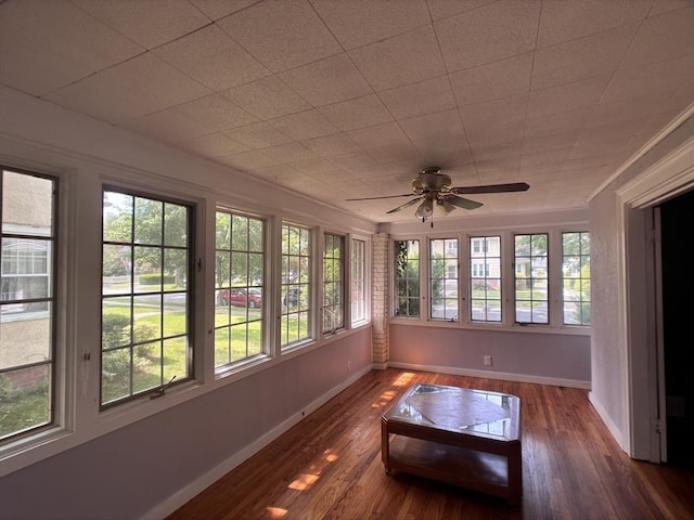 29 Neptune Ave, West Springfield, MA 01089 - sunroom featuring baseboards and wood finished floors