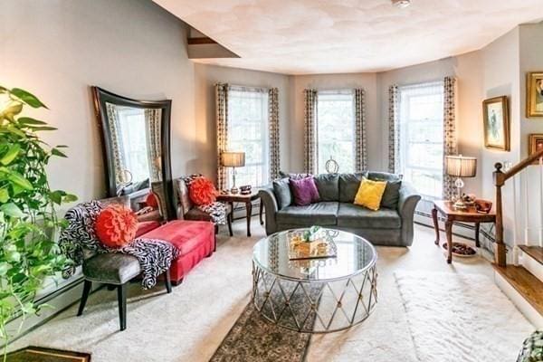 117 Church St Unit 4, North Attleboro, MA 02760 - living area with stairway and a wealth of natural light