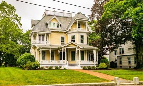 117 Church St Unit 4, North Attleboro, MA 02760 - victorian house with covered porch, a balcony, and a front yard