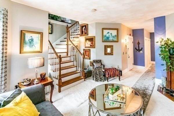 117 Church St Unit 4, North Attleboro, MA 02760 - living area featuring baseboards, carpet flooring, and stairway