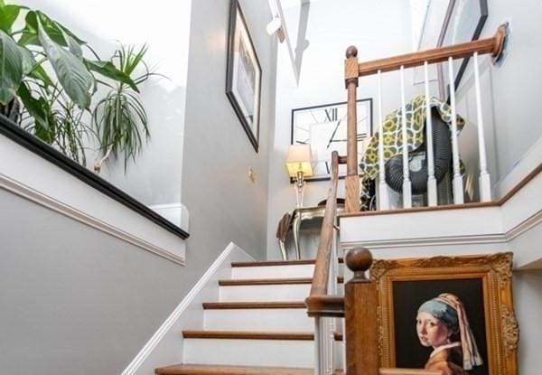 117 Church St Unit 4, North Attleboro, MA 02760 - stairway featuring a towering ceiling