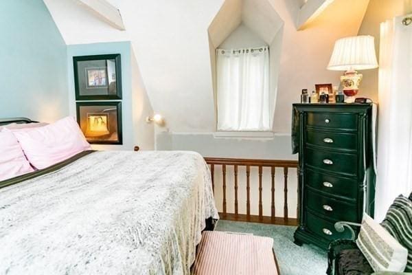 117 Church St Unit 4, North Attleboro, MA 02760 - carpeted bedroom featuring vaulted ceiling
