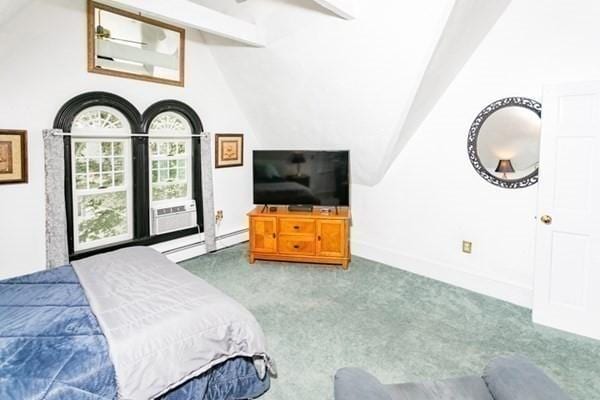 117 Church St Unit 4, North Attleboro, MA 02760 - carpeted bedroom featuring baseboards, ceiling fan, baseboard heating, cooling unit, and lofted ceiling with beams