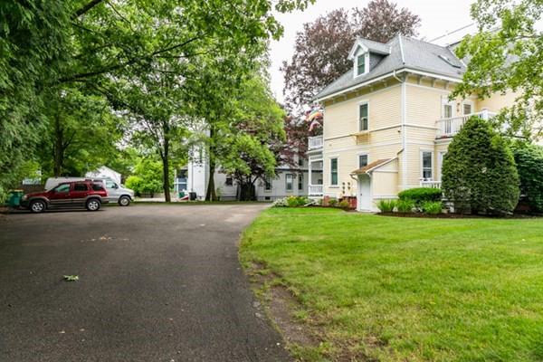 117 Church St Unit 4, North Attleboro, MA 02760 - view of side of home featuring a yard