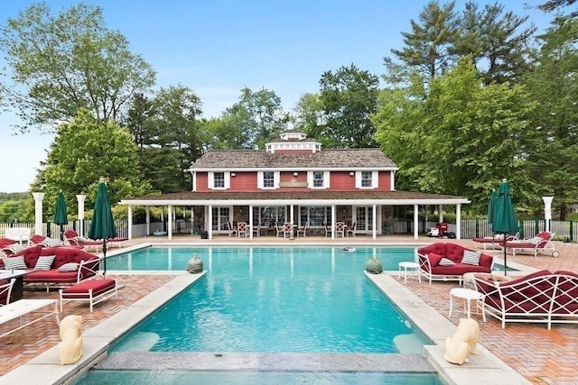 view of pool featuring a patio