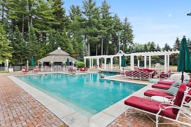 view of swimming pool with a gazebo, a pergola, and a patio