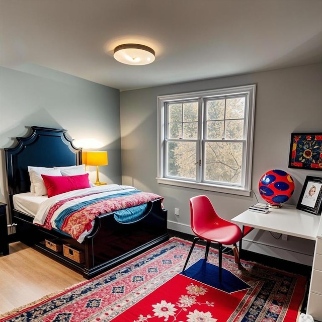 bedroom with wood-type flooring