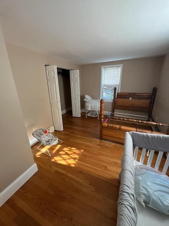 bedroom featuring hardwood / wood-style flooring