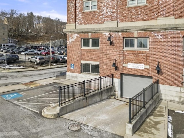 view of side of property with a garage