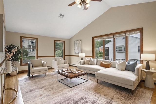 5 Ledgewood Rd, Saugus, MA 01906 - living room with wood finished floors, ceiling fan, healthy amount of natural light, baseboard heating, and high vaulted ceiling