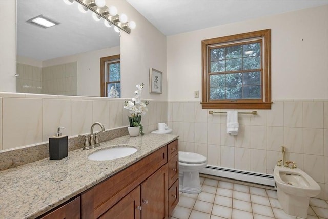 5 Ledgewood Rd, Saugus, MA 01906 - full bath featuring baseboard heating, vanity, tile walls, a bidet, and wainscoting
