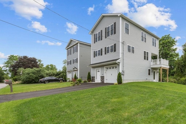 15 Spadina, Warwick, RI 02889 - view of property exterior featuring driveway, an attached garage, and a yard