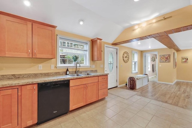 4063 Main St, Palmer, MA 01069 - kitchen with black dishwasher, a sink, light countertops, plenty of natural light, and vaulted ceiling