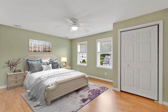 4063 Main St, Palmer, MA 01069 - bedroom featuring light wood-style flooring, baseboards, ceiling fan, and a closet