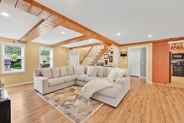 4063 Main St, Palmer, MA 01069 - living area with stairway, baseboards, light wood-style floors, and recessed lighting