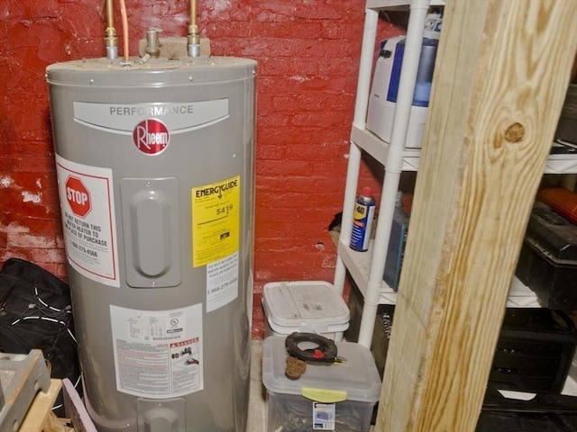 utility room with electric water heater