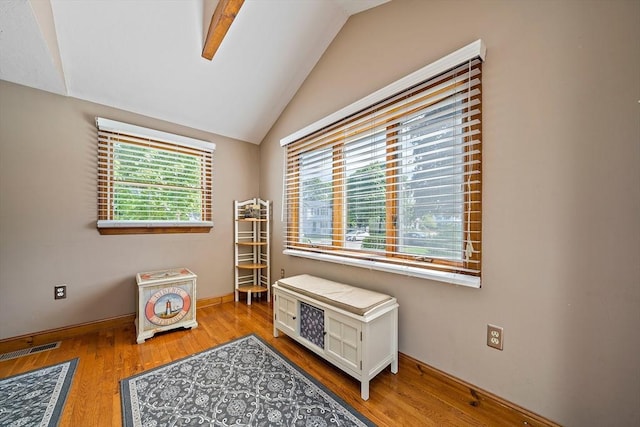 40 Mamie Rd, Weymouth, MA 02190 - miscellaneous room with vaulted ceiling, wood finished floors, and baseboards