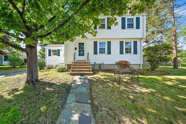 40 Mamie Rd, Weymouth, MA 02190 - view of front of home with entry steps and a front lawn