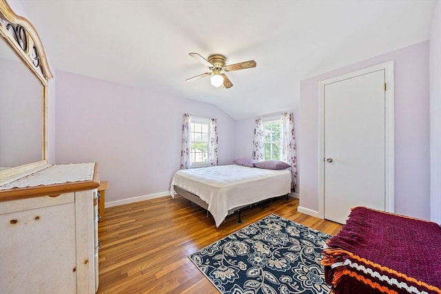 40 Mamie Rd, Weymouth, MA 02190 - bedroom with lofted ceiling, light wood-style flooring, ceiling fan, and baseboards