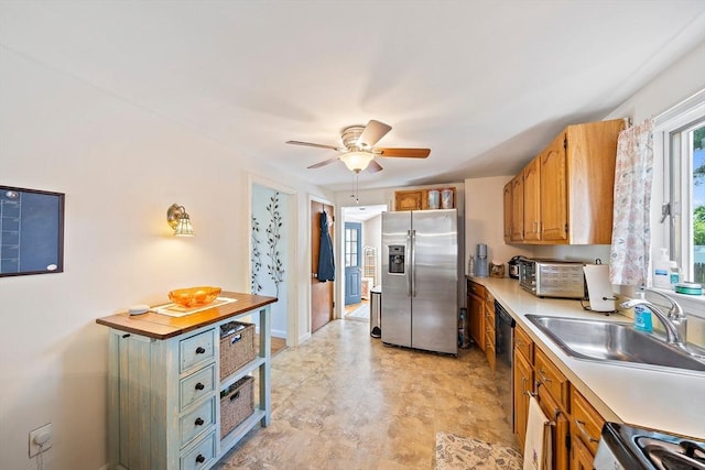 40 Mamie Rd, Weymouth, MA 02190 - kitchen with appliances with stainless steel finishes, a sink, light countertops, and brown cabinetry
