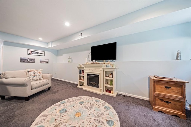 61 Hingham Ave, Marshfield, MA 02050 - living area with carpet, baseboards, recessed lighting, and a glass covered fireplace