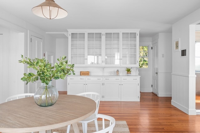 dining area with hardwood / wood-style flooring