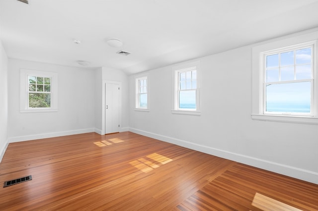 empty room with wood-type flooring