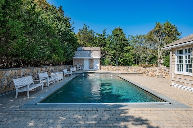 view of pool with a patio