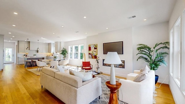 140 Columbia St, Brookline, MA 02446 - living area featuring recessed lighting, light wood-type flooring, and baseboards
