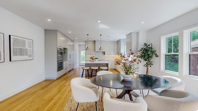 140 Columbia St, Brookline, MA 02446 - dining space with plenty of natural light, light wood finished floors, recessed lighting, and baseboards