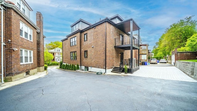 140 Columbia St, Brookline, MA 02446 - view of home's exterior with a balcony