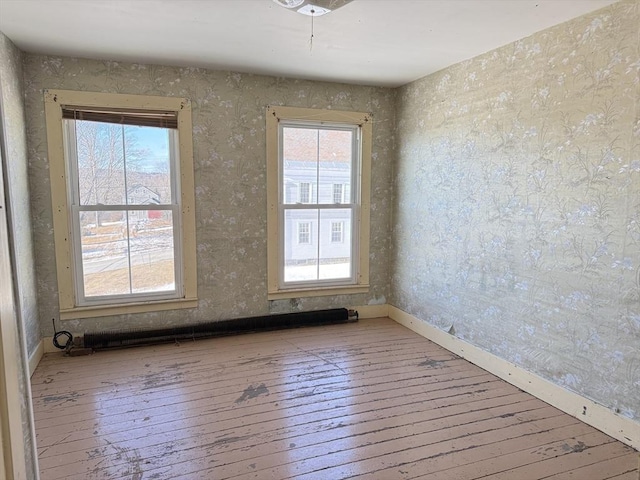 spare room with light wood-type flooring