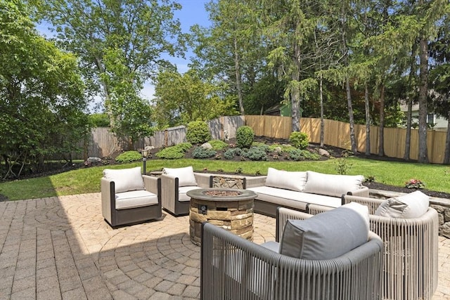 22 Scotney, Newton, MA 02467 - fenced backyard with an outdoor living space with a fire pit and a patio area