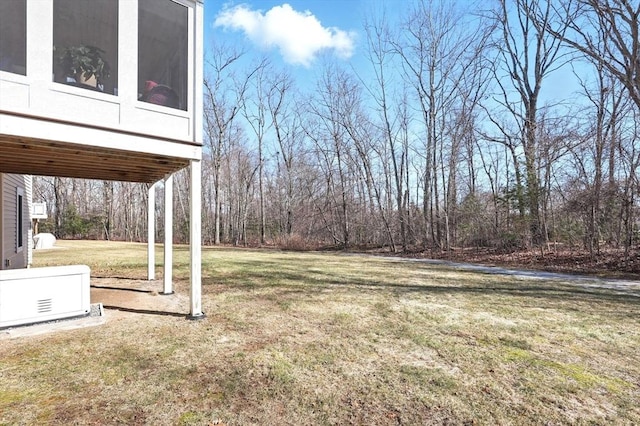 view of yard featuring a sunroom