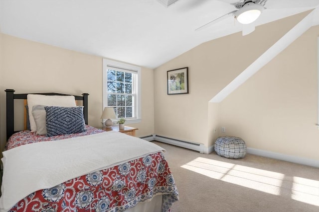 carpeted bedroom with vaulted ceiling, a baseboard heating unit, and ceiling fan