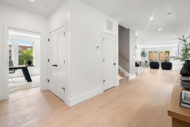 33 Evergreen St Unit 2, Boston, MA 02130 - corridor with light wood-style flooring, stairway, healthy amount of natural light, and recessed lighting
