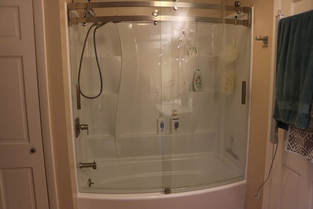 bathroom featuring  shower combination