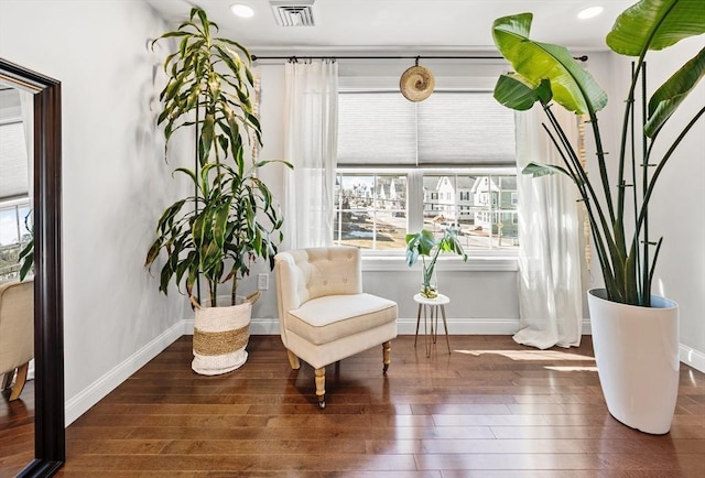 sitting room featuring recessed lighting, baseboards, visible vents, and wood-type flooring