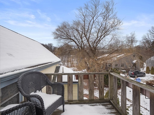 view of snow covered deck