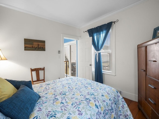 bedroom featuring crown molding and hardwood / wood-style flooring