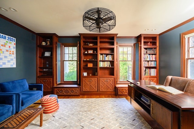 sitting room featuring ceiling fan, ornamental molding, and hardwood / wood-style floors