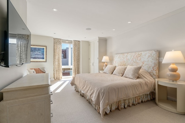 carpeted bedroom featuring ornamental molding and multiple windows