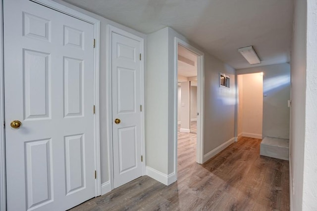 hallway featuring light hardwood / wood-style floors