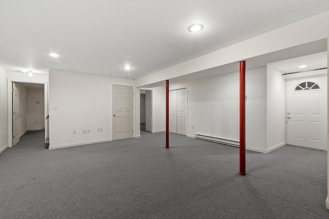 finished below grade area featuring carpet floors, recessed lighting, a baseboard radiator, and baseboards