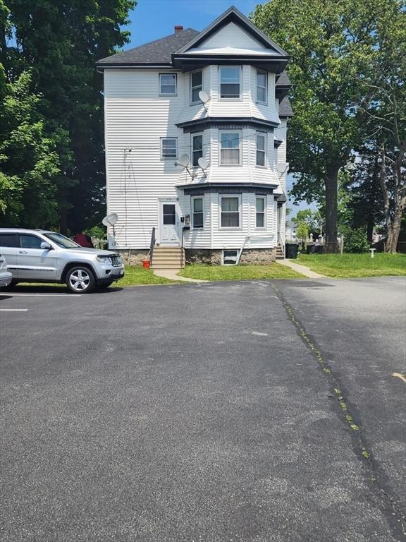 302 Cory St, Fall River, MA 02720 - view of side of property featuring uncovered parking