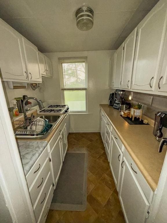 302 Cory St, Fall River, MA 02720 - kitchen with white cabinets and light countertops