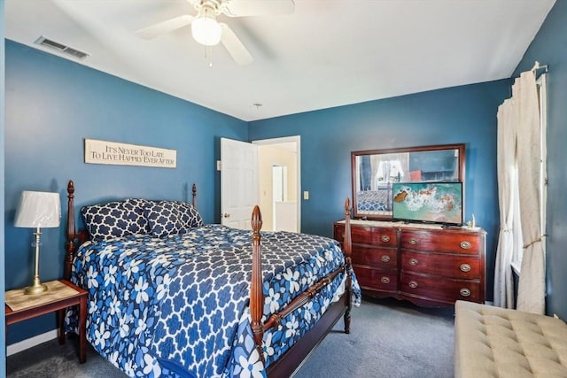bedroom featuring visible vents, carpet flooring, and a ceiling fan