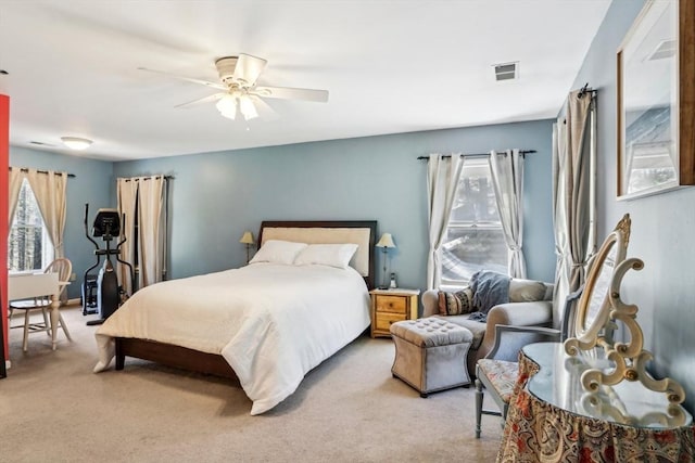 carpeted bedroom with visible vents