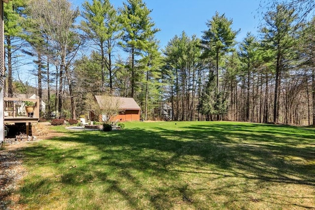 view of yard with a deck