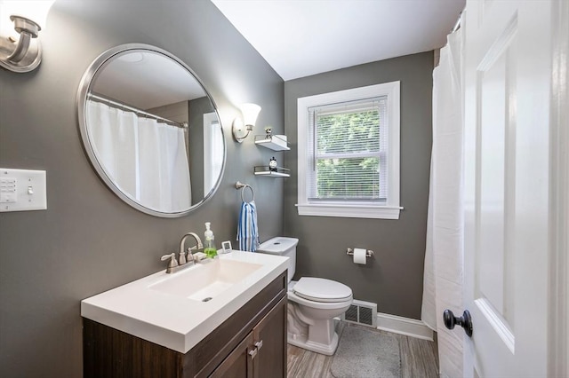 107 Washington St, Pembroke, MA 02359 - full bath with vanity and wood finished floors
